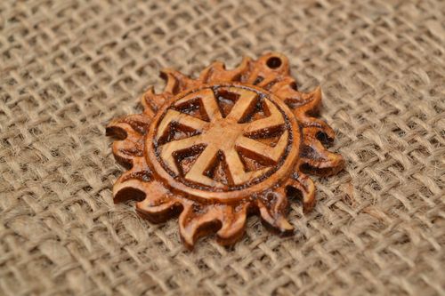Round wooden ethnic handmade amulet pectoral pendant Kolovrat in the Sun  - MADEheart.com