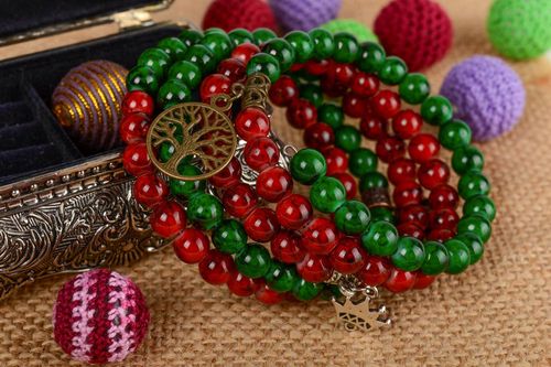 Handmade designer multi row red and green glass beaded wrist bracelet with charm - MADEheart.com
