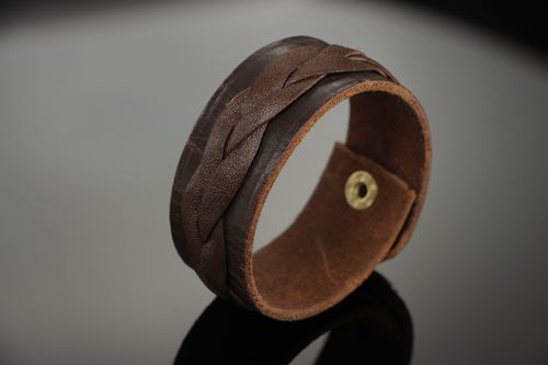 Handmade wrist bracelet woven of genuine brown leather with metal stud unisex - MADEheart.com