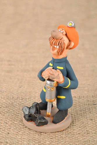 A estátua original de barro Mineiro - MADEheart.com