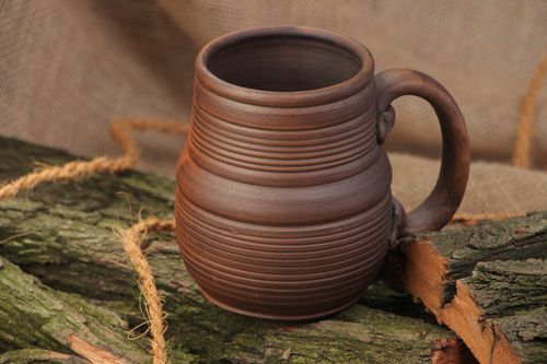 Homemade dark brown ceramic beer mug molded of red clay kilned with milk - MADEheart.com