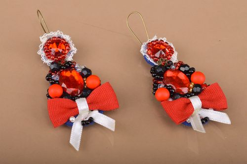 Handmade festive beaded dangle earrings with bows in red color palette for women - MADEheart.com