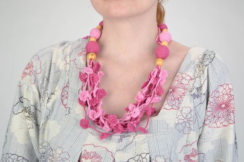 Handmade wooden bead necklace crocheted over with cotton threads of pink color - MADEheart.com