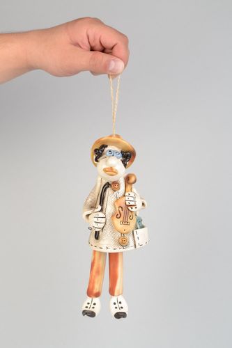 Homemade decorative ceramic wall hanging bell in the shape of man with violin - MADEheart.com