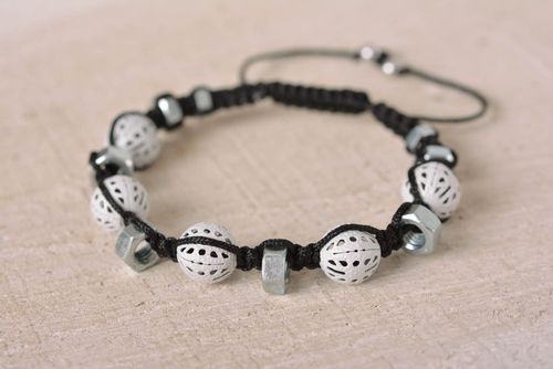 Strand black cord bracelet with white ceramic beads and female metal screws - MADEheart.com