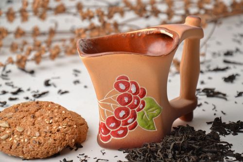 Handmade glazed clay coffee cup with a wide handle and red floral pattern 0,63 lb - MADEheart.com