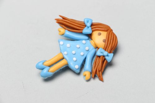 Plastic brooch in the shape of doll Drops - MADEheart.com