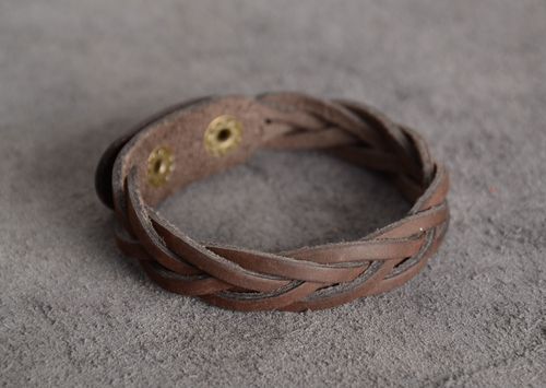 Handmade wrist bracelet woven of brown genuine leather with metal studs - MADEheart.com