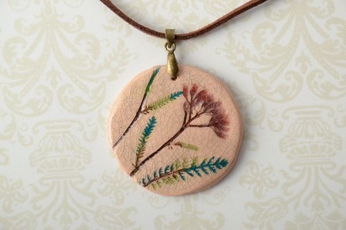 Ceramic pendant with stamps of plants  - MADEheart.com