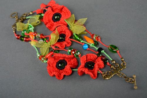 Red bracelet with crochet flowers - MADEheart.com