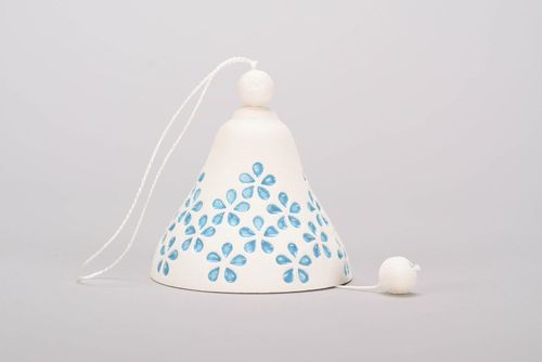 Handmade bell made from white clay with embossment - MADEheart.com