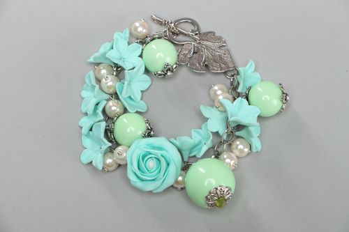 Handmade beautiful designer flower bracelet with charms made of polymer clay in mint color - MADEheart.com