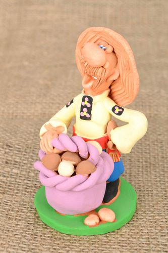 Homemade ceramic statuette Mushroom Picker with a Basket - MADEheart.com