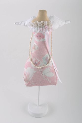 Handmade decorative mini mannequin needle pillow with wings made of natural fabrics - MADEheart.com