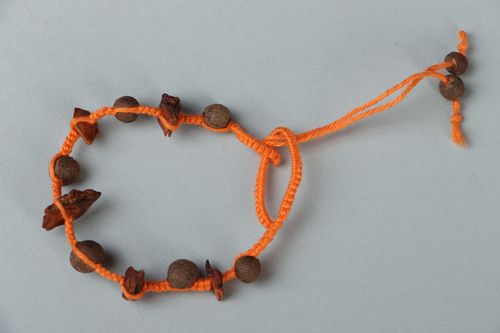 Homemade aroma strand bracelet on an orange rope with coffee beans - MADEheart.com