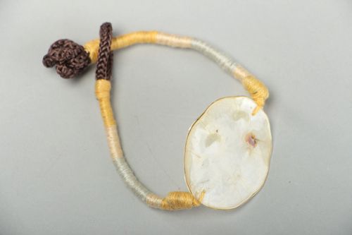 Handmade friendship bracelet with dried flowers coated with epoxy Lunaria - MADEheart.com