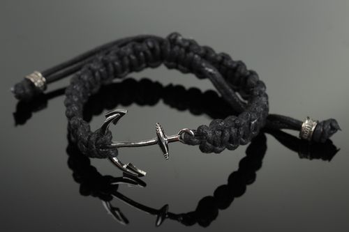 Handmade designer friendship bracelet woven of waxed cord with anchor charm unisex - MADEheart.com