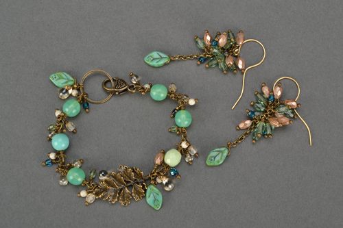 Female beautiful handmade jewelry made of glass beads bracelet and earrings - MADEheart.com