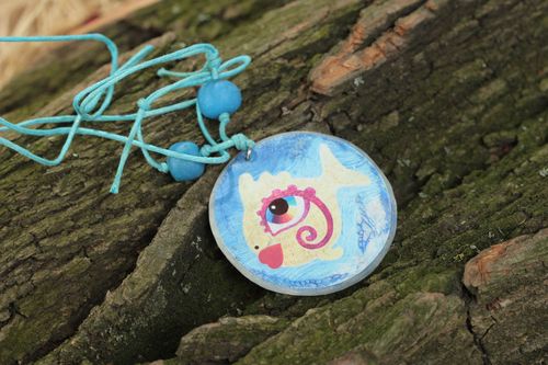 Handmade round shape pendant with blue fish print made of polymer clay - MADEheart.com