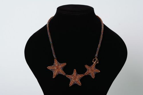 Handmade large necklace woven of beads of bronze color with three stars - MADEheart.com