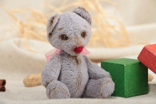 Handmade small faux fur soft toy bear of gray color with pink bow for children - MADEheart.com