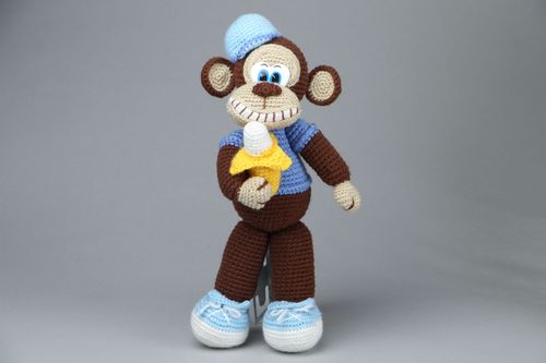 Handmade crochet toy Monkey with a Banana - MADEheart.com