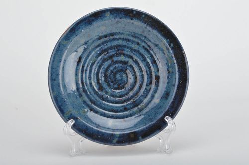 Handmade decorative round ceramic plate coated with glaze in deep blue color - MADEheart.com