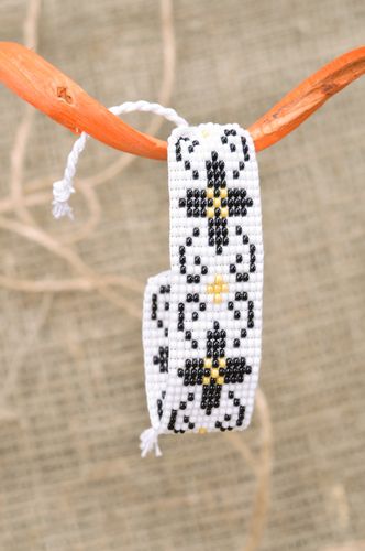 Beautiful wide beaded bracelet with flower pattern and ties - MADEheart.com