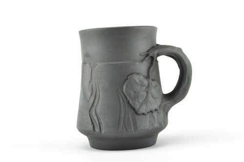 Black clay natural smoked cup with handle and autumn molded leaves pattern - MADEheart.com