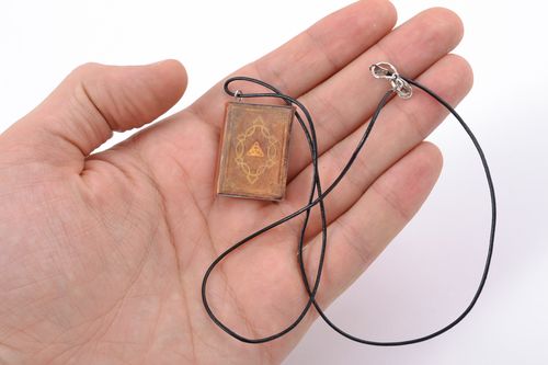 Polymer clay pendant in the shape of book with leather cord - MADEheart.com