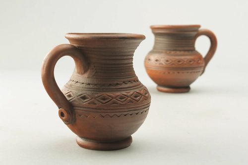 8 oz natural clay cup in the shape of the pitcher with handle and rustic pattern - MADEheart.com