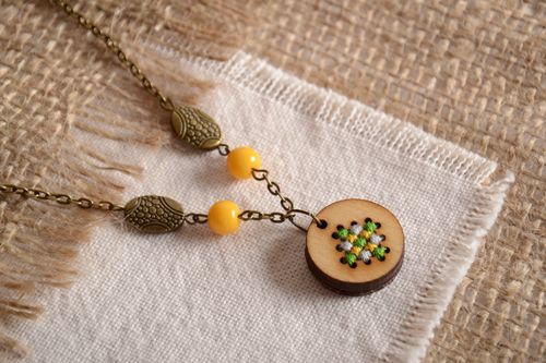 Plywood handmade authors pendant with embroidery on a chain  - MADEheart.com