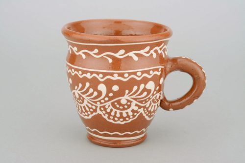 Glazed clay tea cup in terracotta color with eco pattern in white color - MADEheart.com