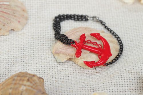 Handmade festive red and black metal and plastic wrist bracelet - MADEheart.com