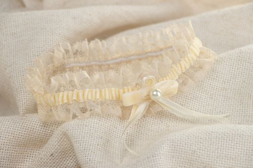 Tender thin lacy wedding bridal garter of champagne color with velor and pearls  - MADEheart.com