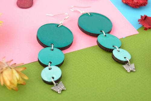 Handmade earrings made of wood and coated with epoxy resin turquoise color - MADEheart.com