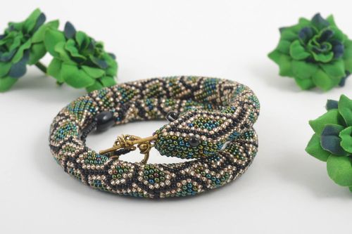 Handmade snake shape wrist beaded cord bracelet in dark green color for women  - MADEheart.com