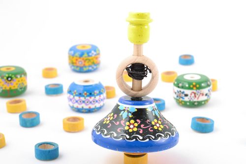Bright colorful wooden handmade spinning top toy painted with eco dyes for kids - MADEheart.com