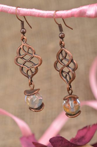 Handmade openwork stylish beautiful long earrings made of metal with beads - MADEheart.com