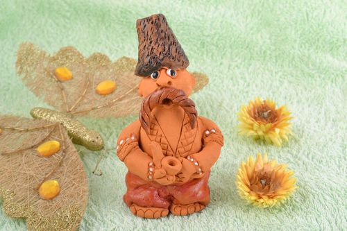 Handmade decorative figurine Cossack in hat made of red clay little funny statuette - MADEheart.com