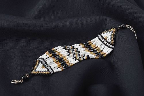 Wide beaded handmade bracelet in white, golden black color  - MADEheart.com