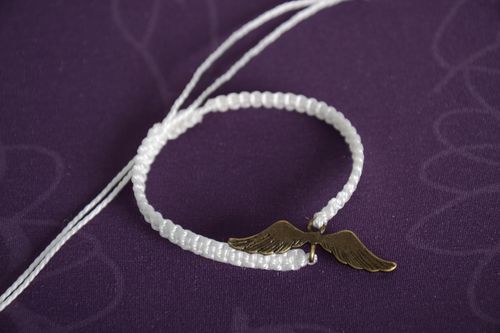 Handmade white womens woven thread bracelet with metal charm - MADEheart.com