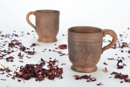 Clay cup for tea in light brown color with Giraffe pattern and handle - MADEheart.com