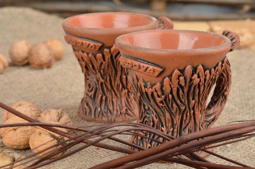 Set of 2 beautiful handmade designer clay cups stylized on wood 100 ml each - MADEheart.com