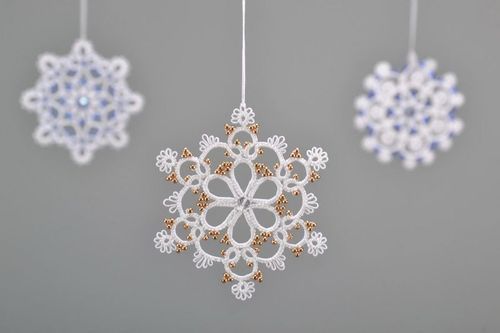 Christmas tree lace decoration in the form of a snowlake - MADEheart.com