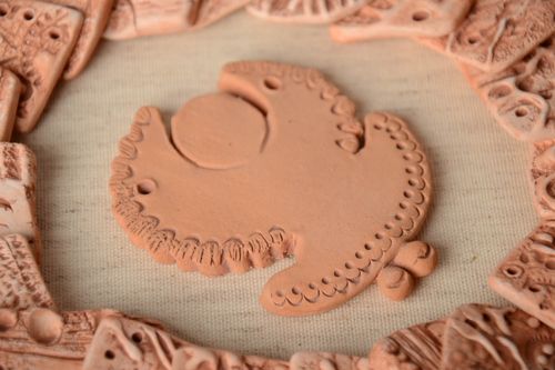 Handmade ceramic craft blank for pendant making in the shape of small angel - MADEheart.com