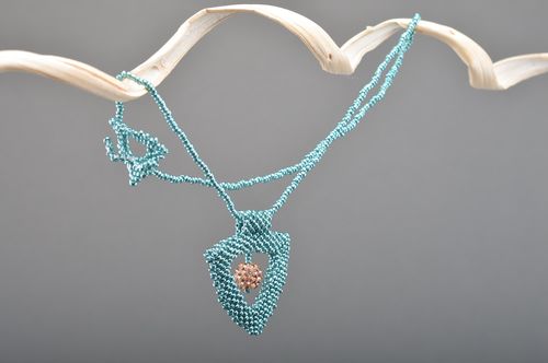 Handmade light blue triangle neck pendant woven of beads on cord with toggle lock - MADEheart.com
