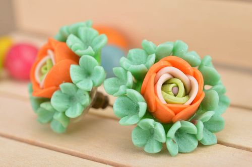 Handmade green and orange stud earrings made of polymer clay in shape of flowers - MADEheart.com