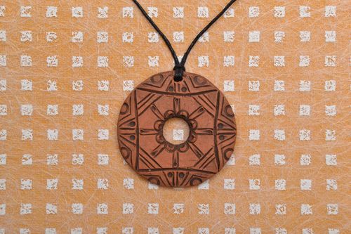 Clay pendant in ethnic style with cord - MADEheart.com