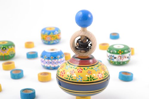 Childrens handmade painted wooden spinning top with ring eco toy - MADEheart.com